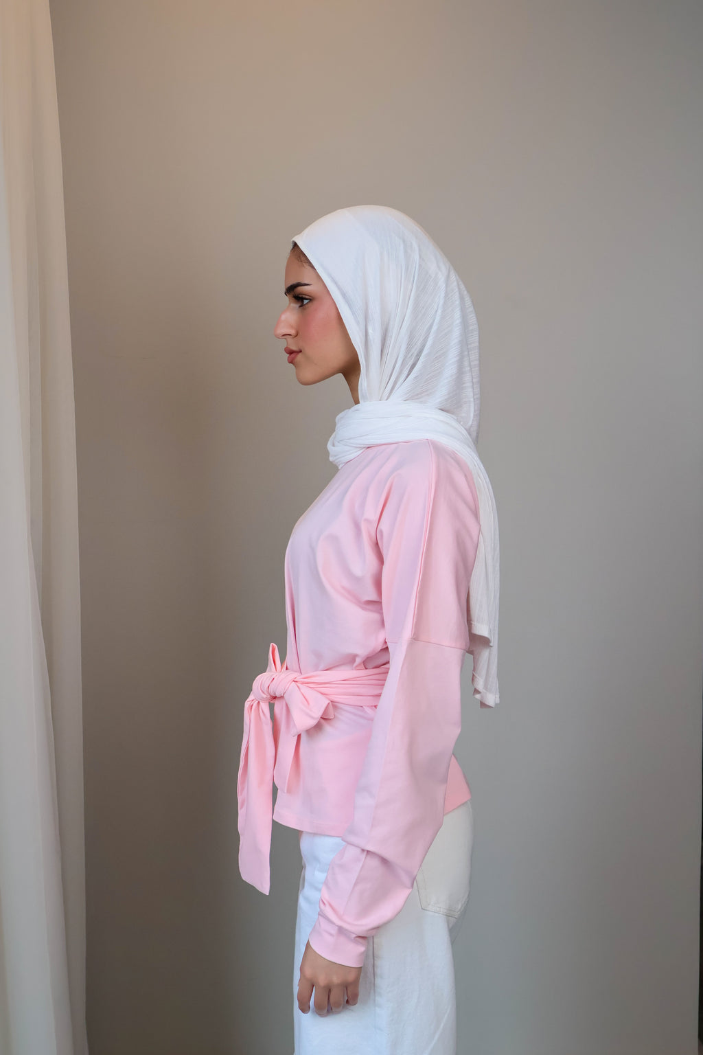 Belted long sleeve crewneck