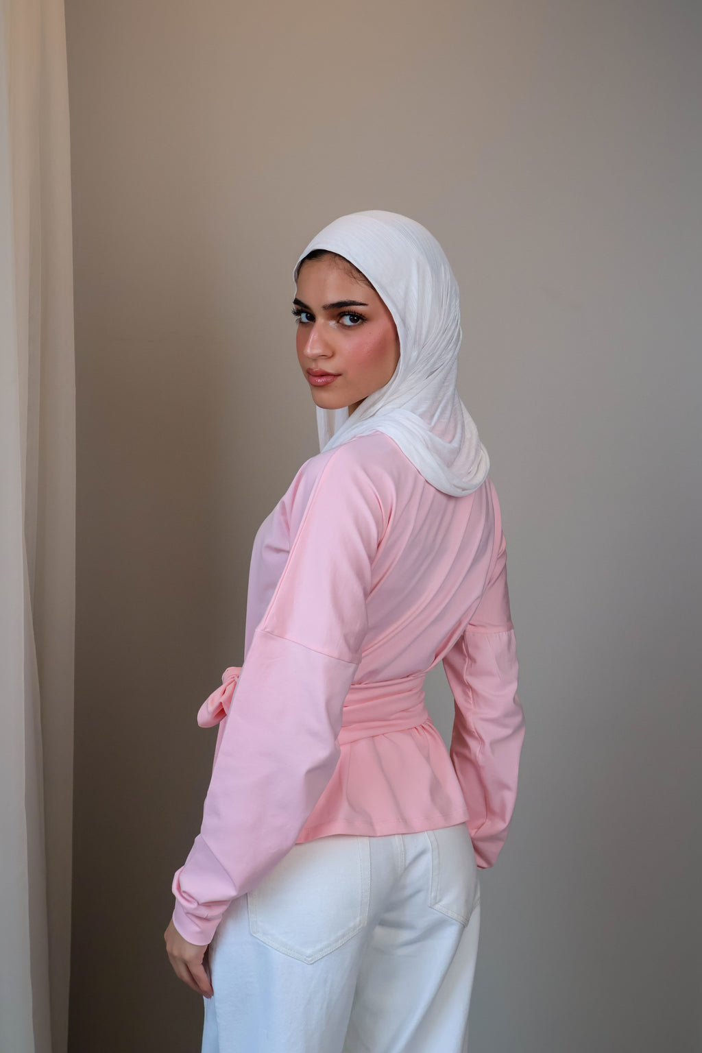 Belted long sleeve crewneck