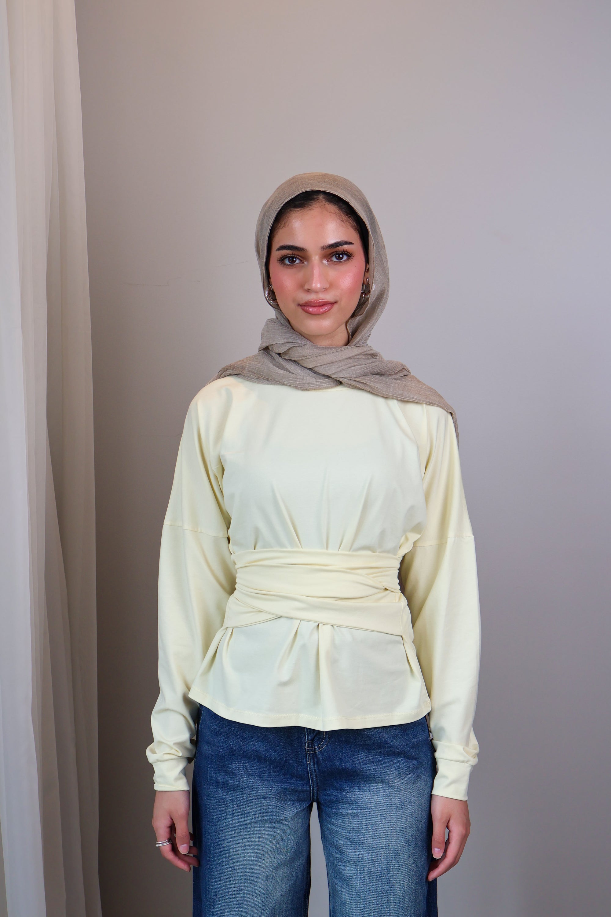Belted long sleeve crewneck