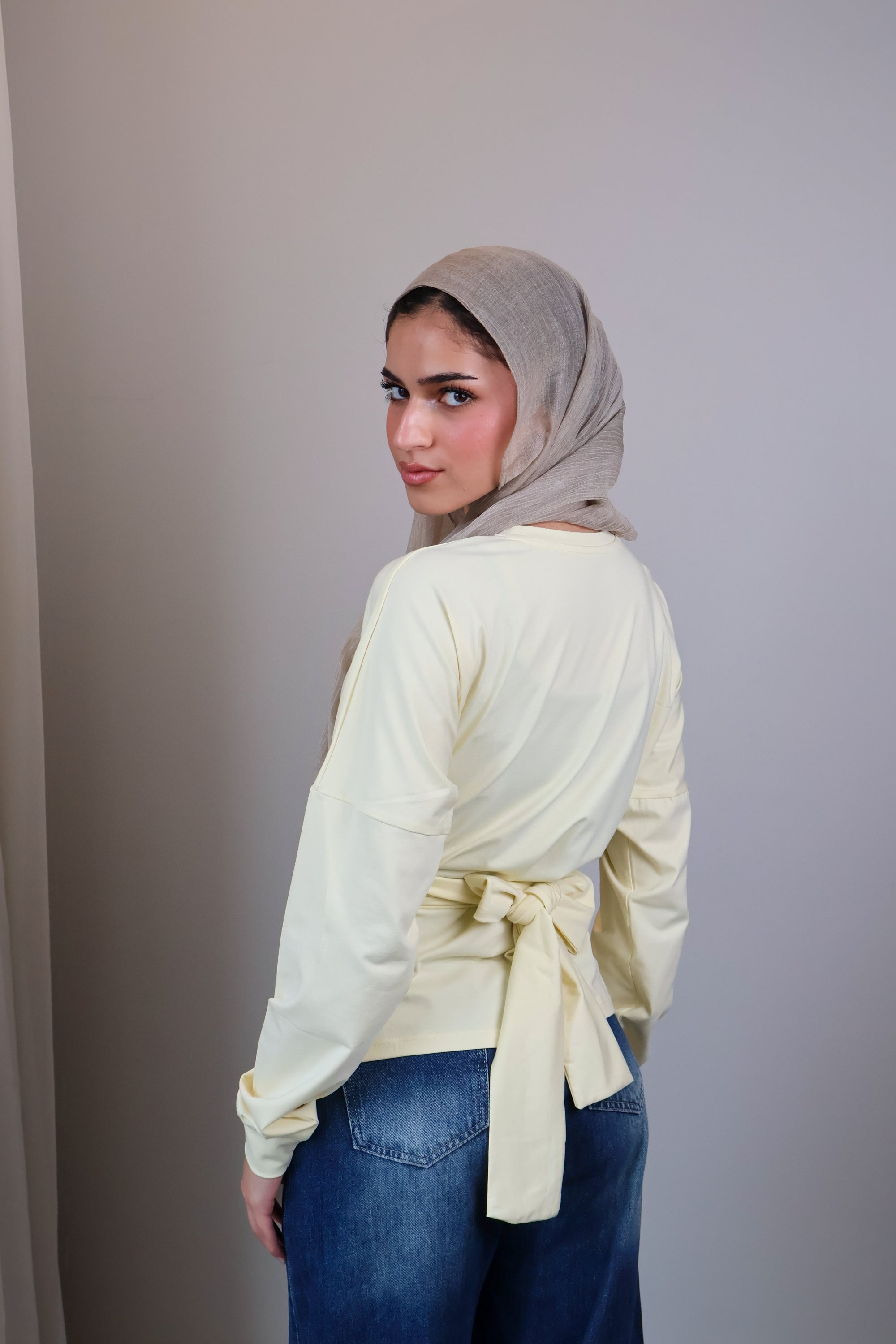 Belted long sleeve crewneck