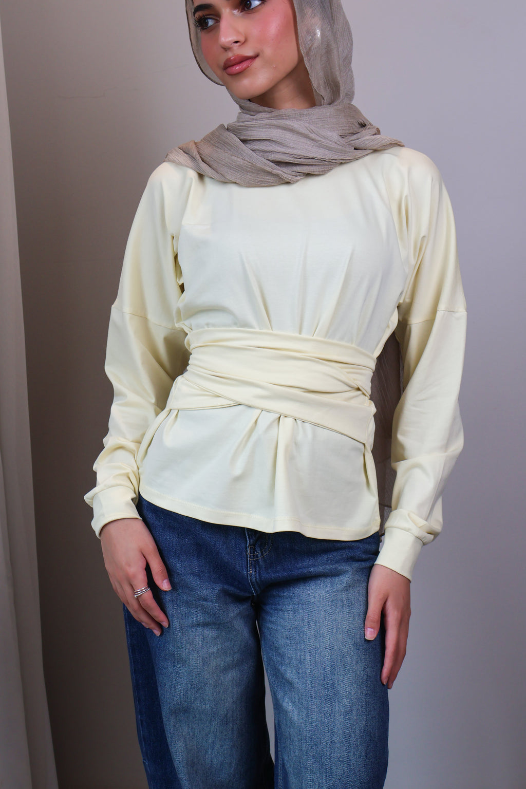 Belted long sleeve crewneck