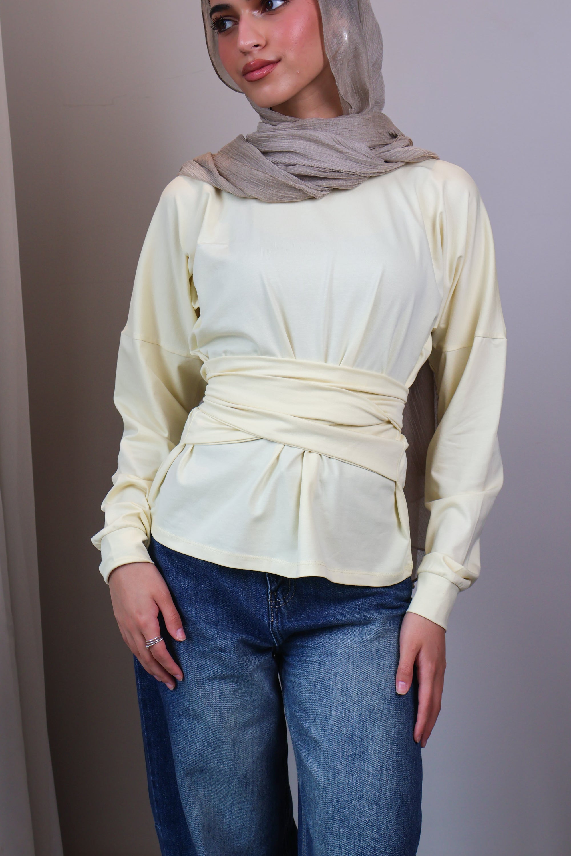 Belted long sleeve crewneck