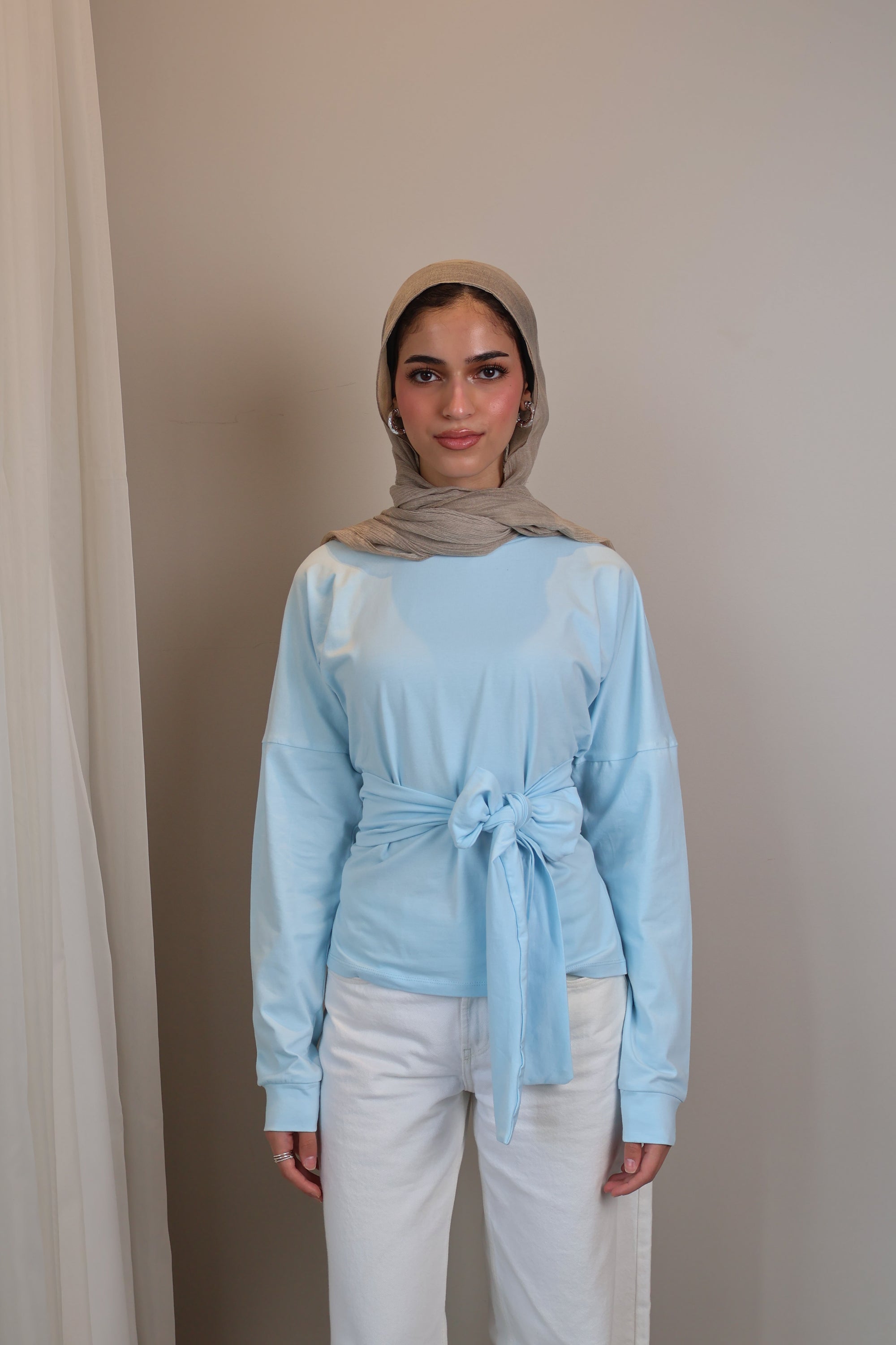 Belted long sleeve crewneck