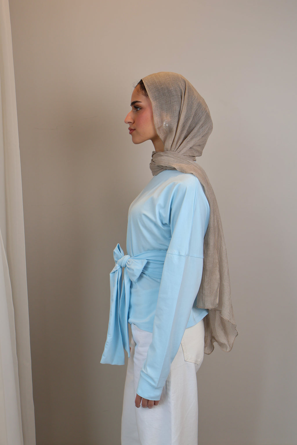 Belted long sleeve crewneck