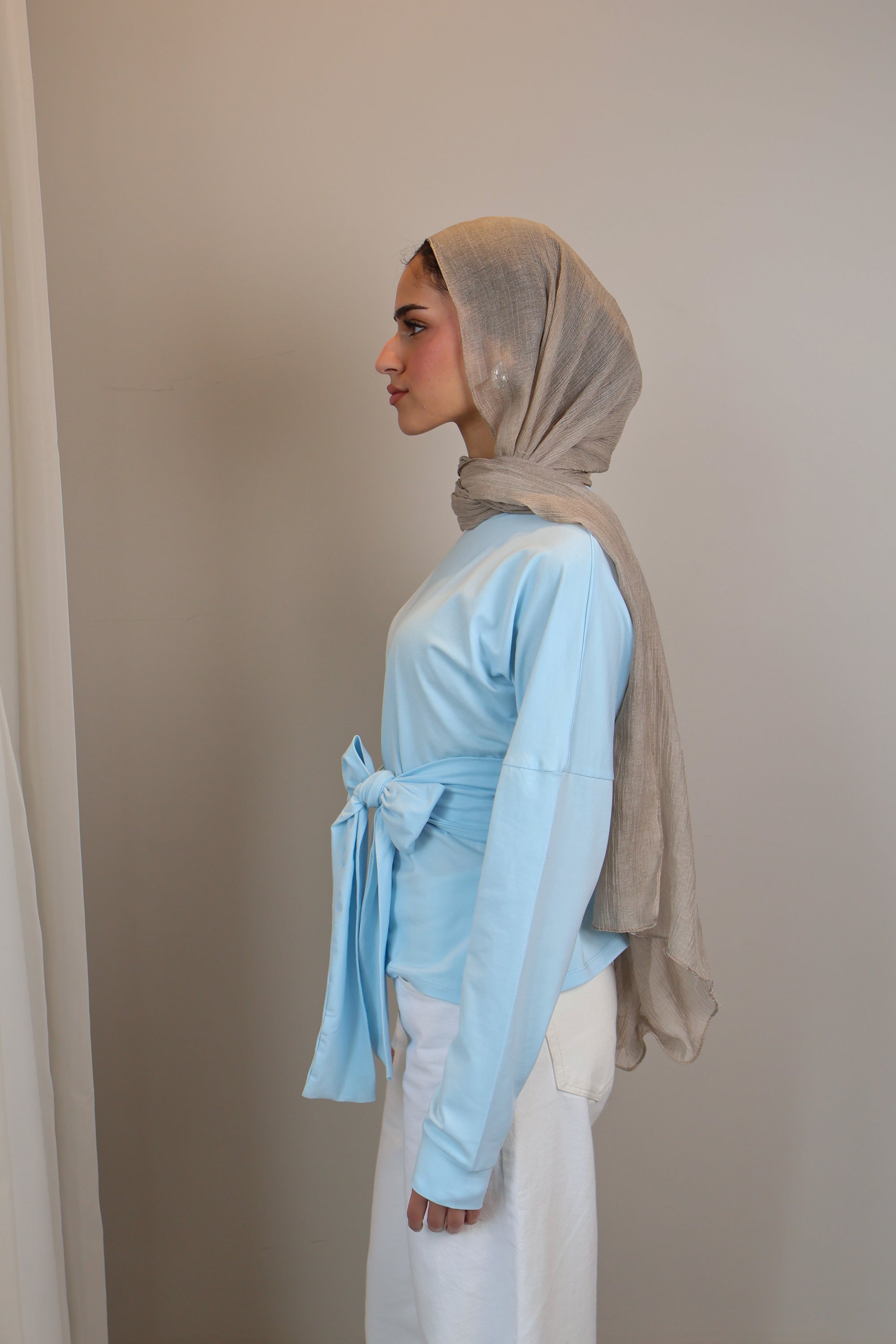 Belted long sleeve crewneck
