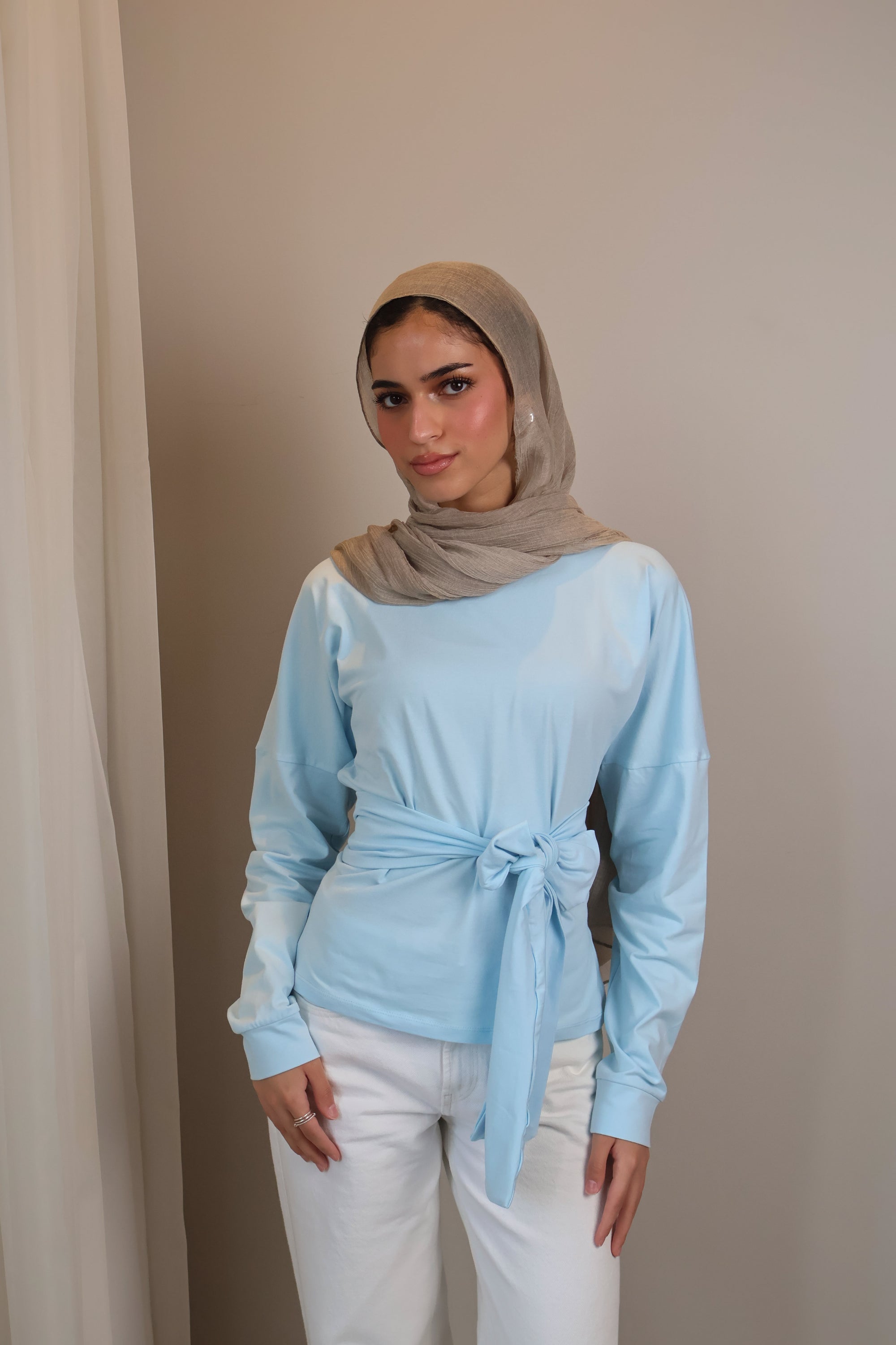 Belted long sleeve crewneck