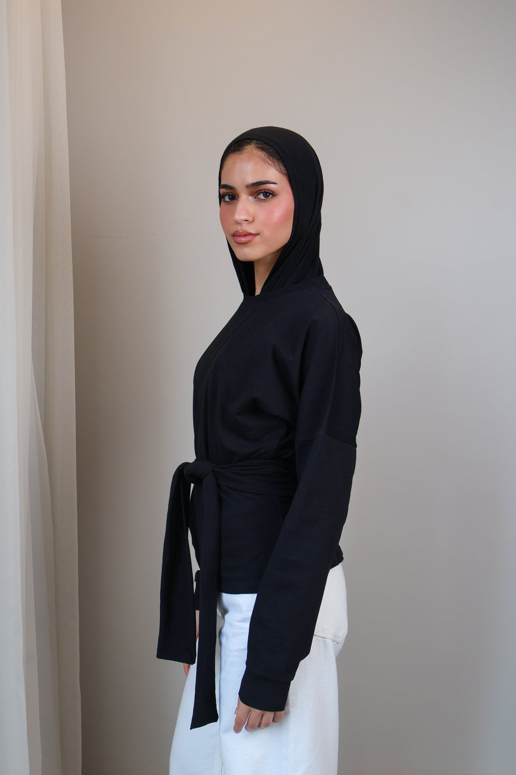 Belted long sleeve crewneck
