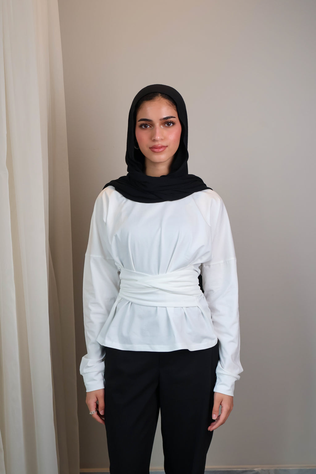 Belted long sleeve crewneck