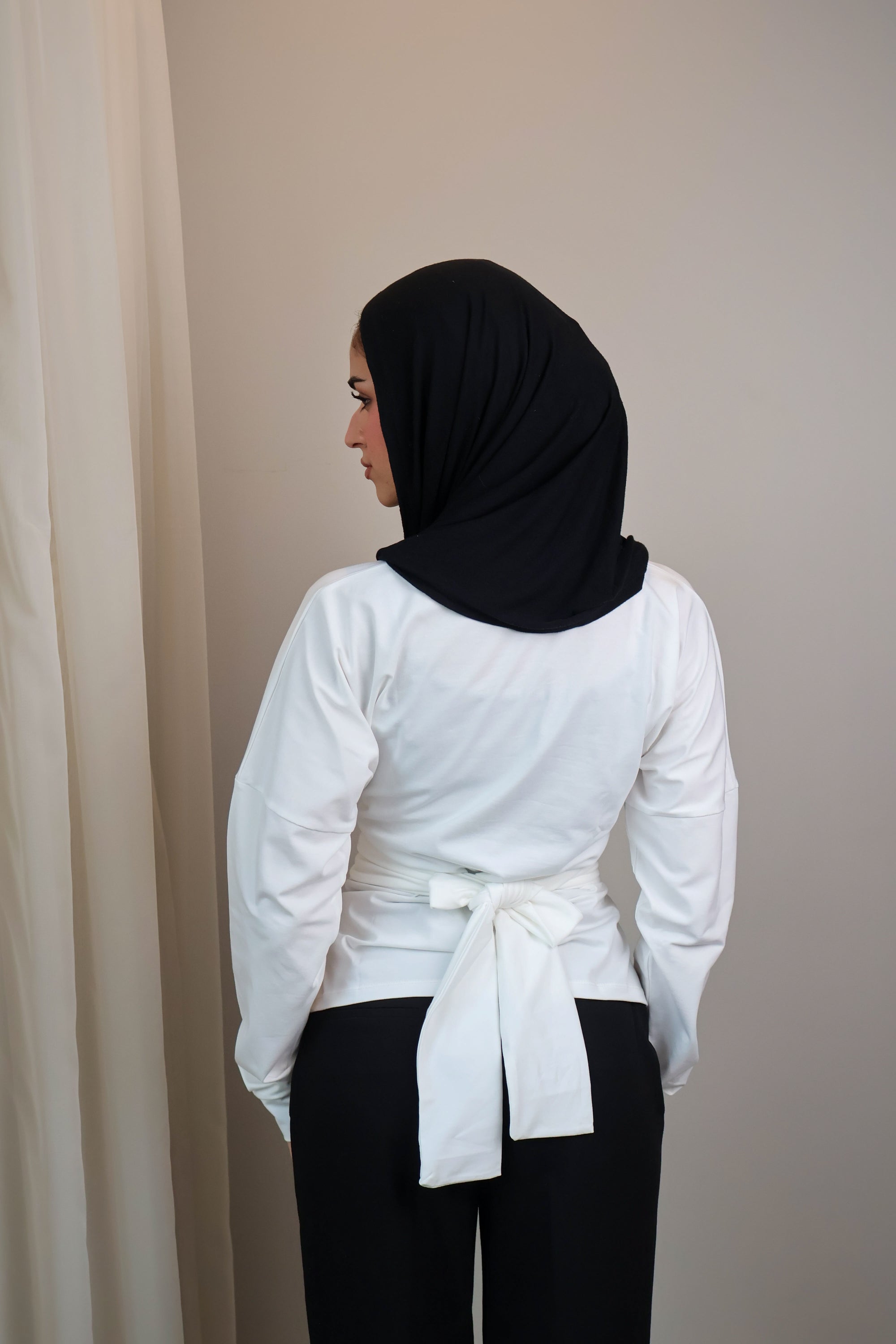 Belted long sleeve crewneck