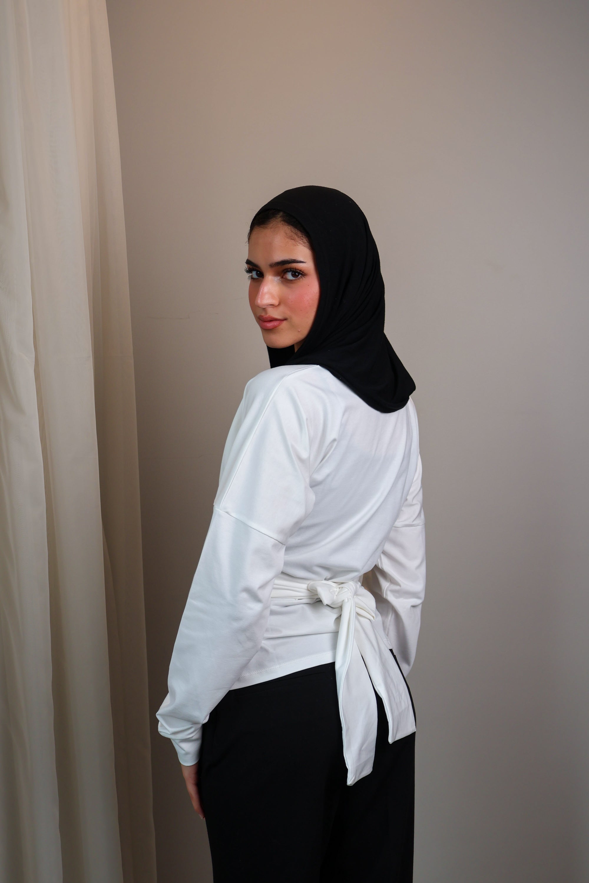 Belted long sleeve crewneck