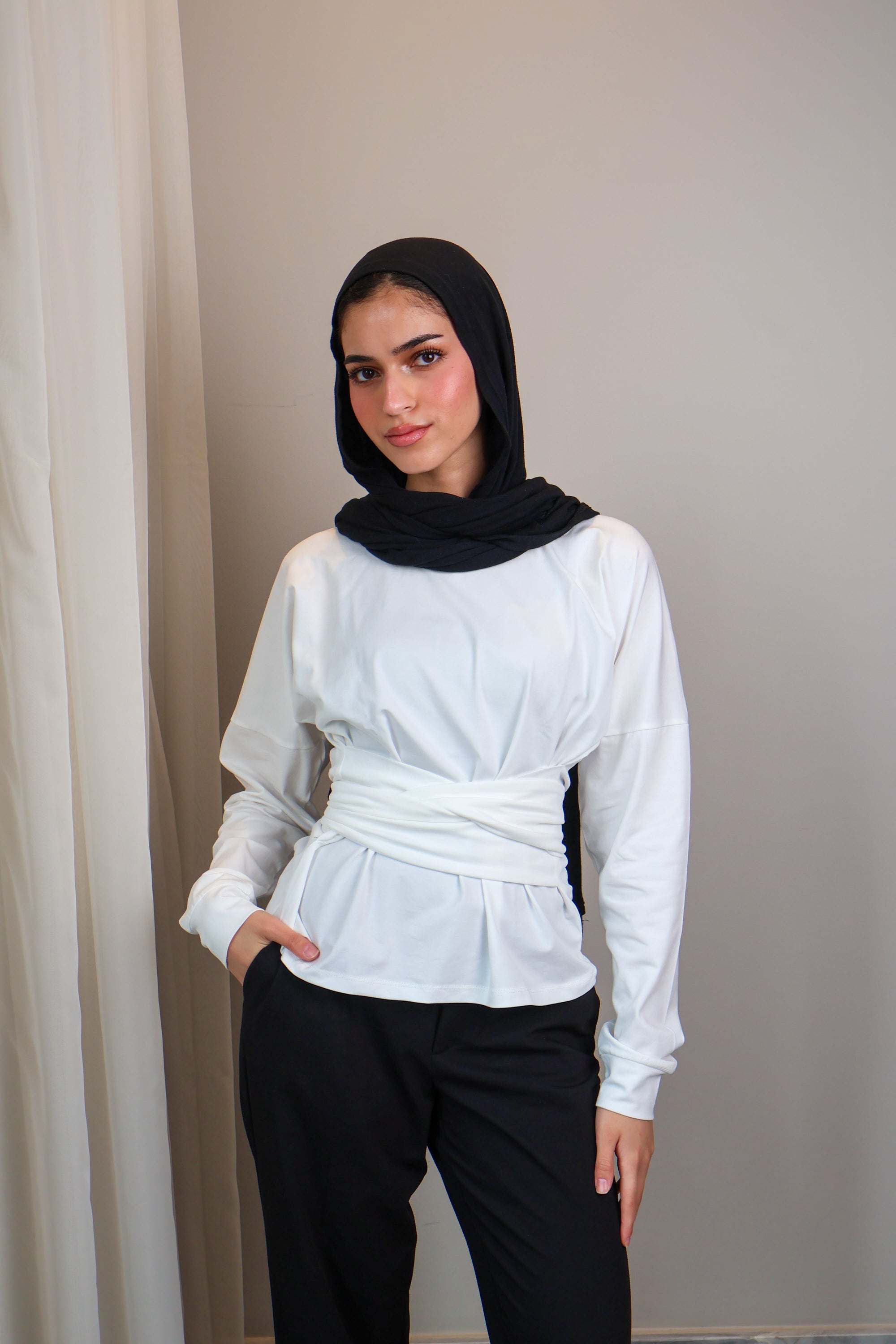 Belted long sleeve crewneck