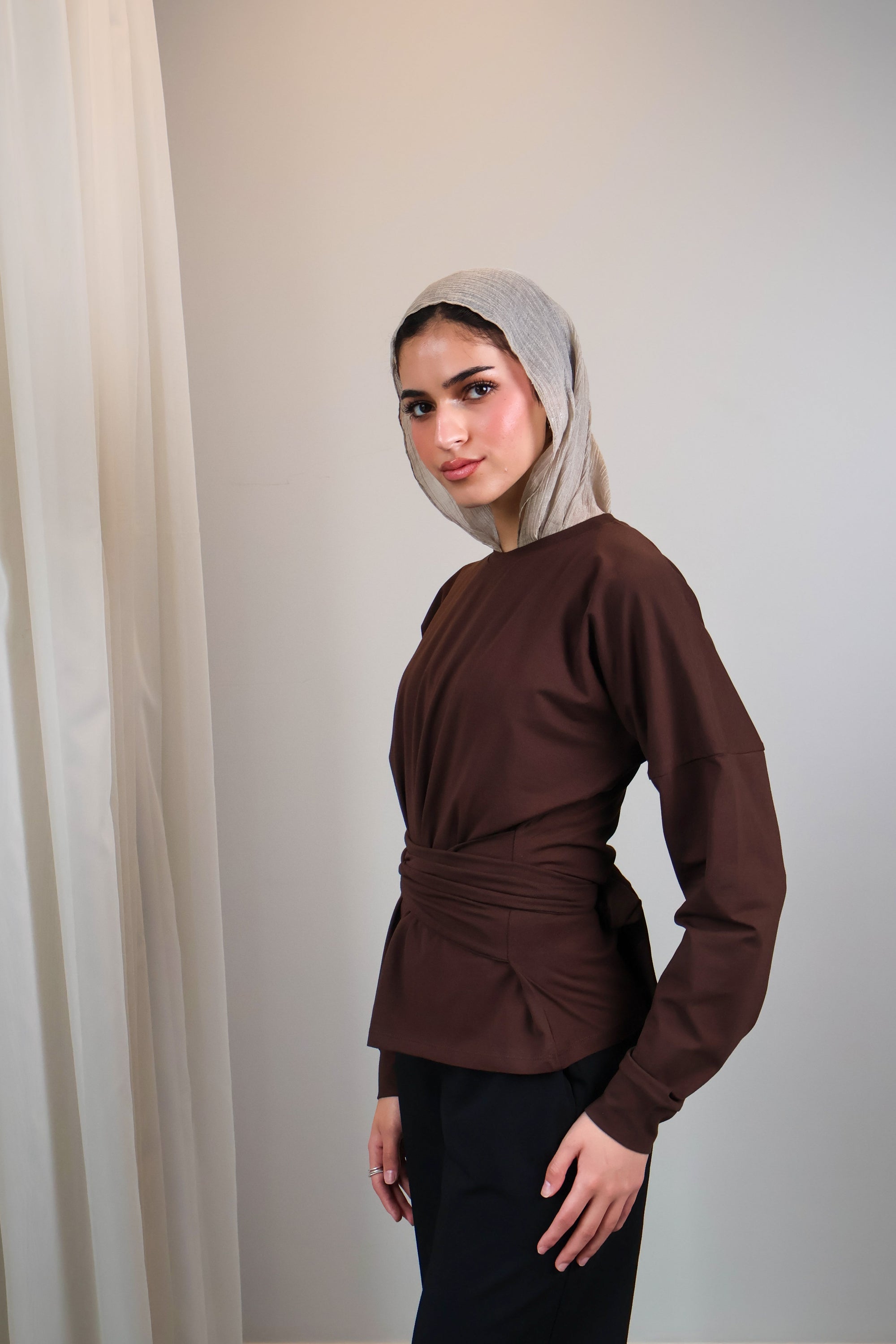 Belted long sleeve crewneck
