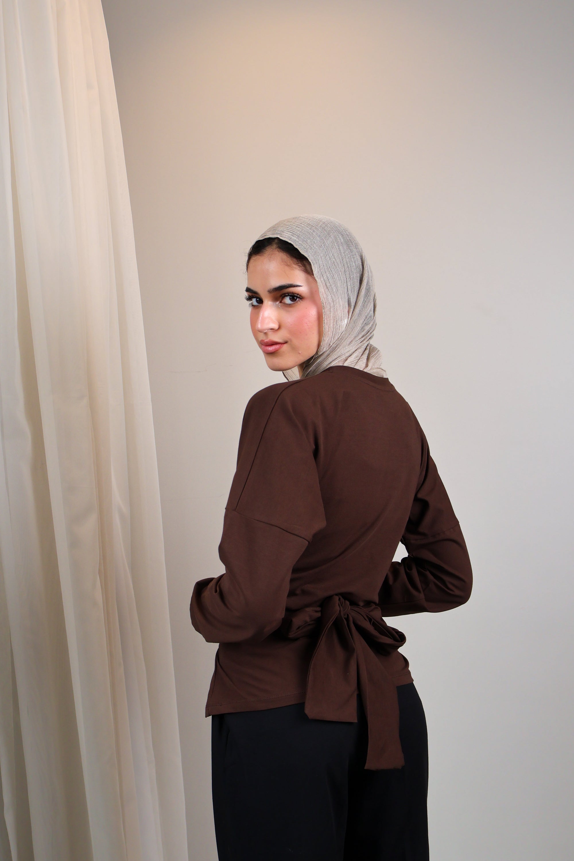 Belted long sleeve crewneck